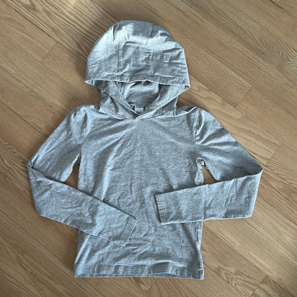 TNA gray long sleeve hooded Jersey top